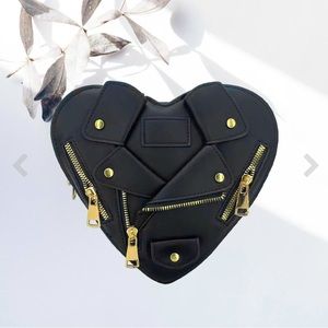 Heart shaped “leather” jacket purse.